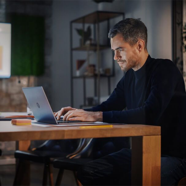 Illustration of a man working on a computer